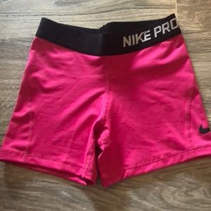 Pink and black Nike pro spandex. Youth medium